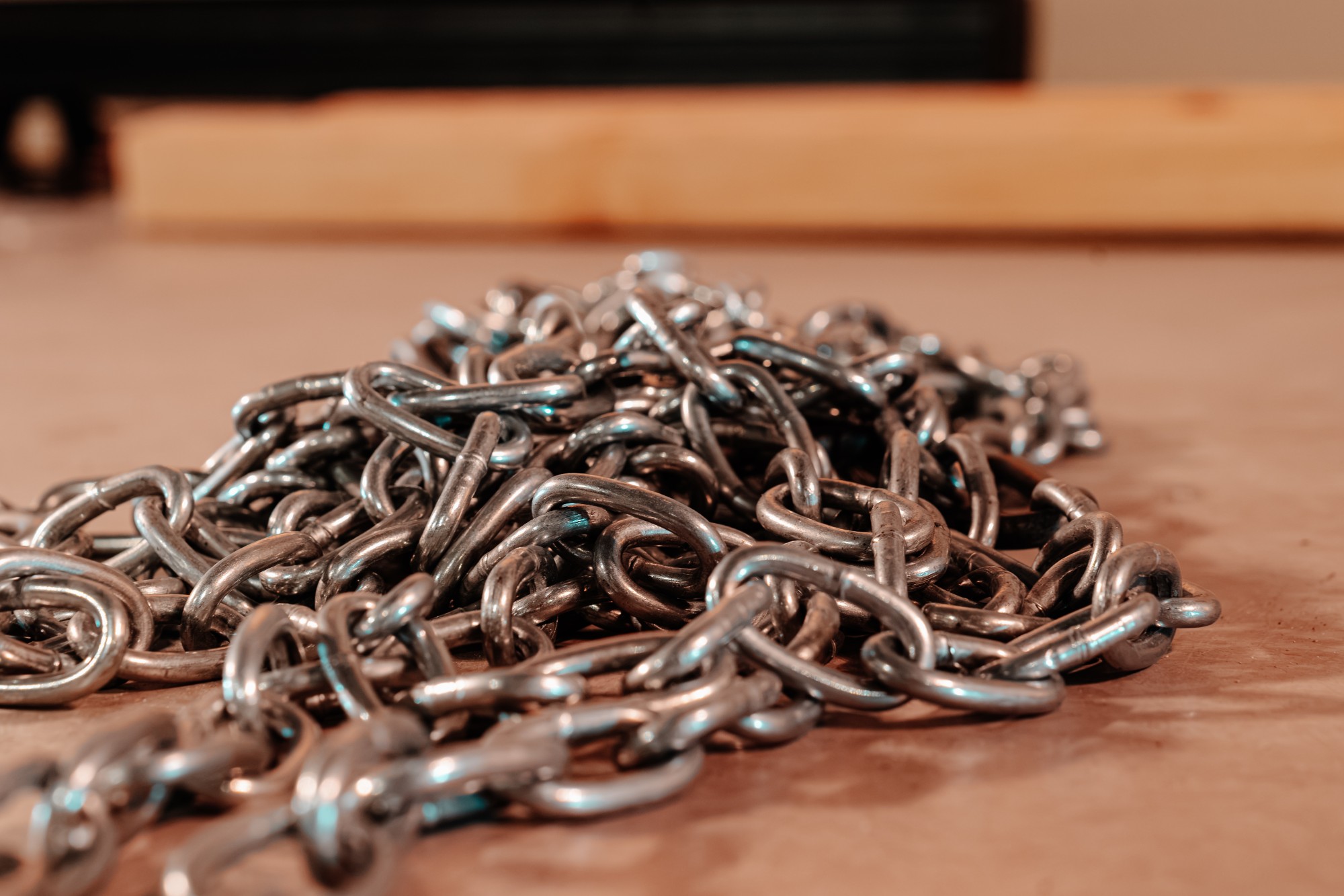 A heap of steel chain on the studio floor